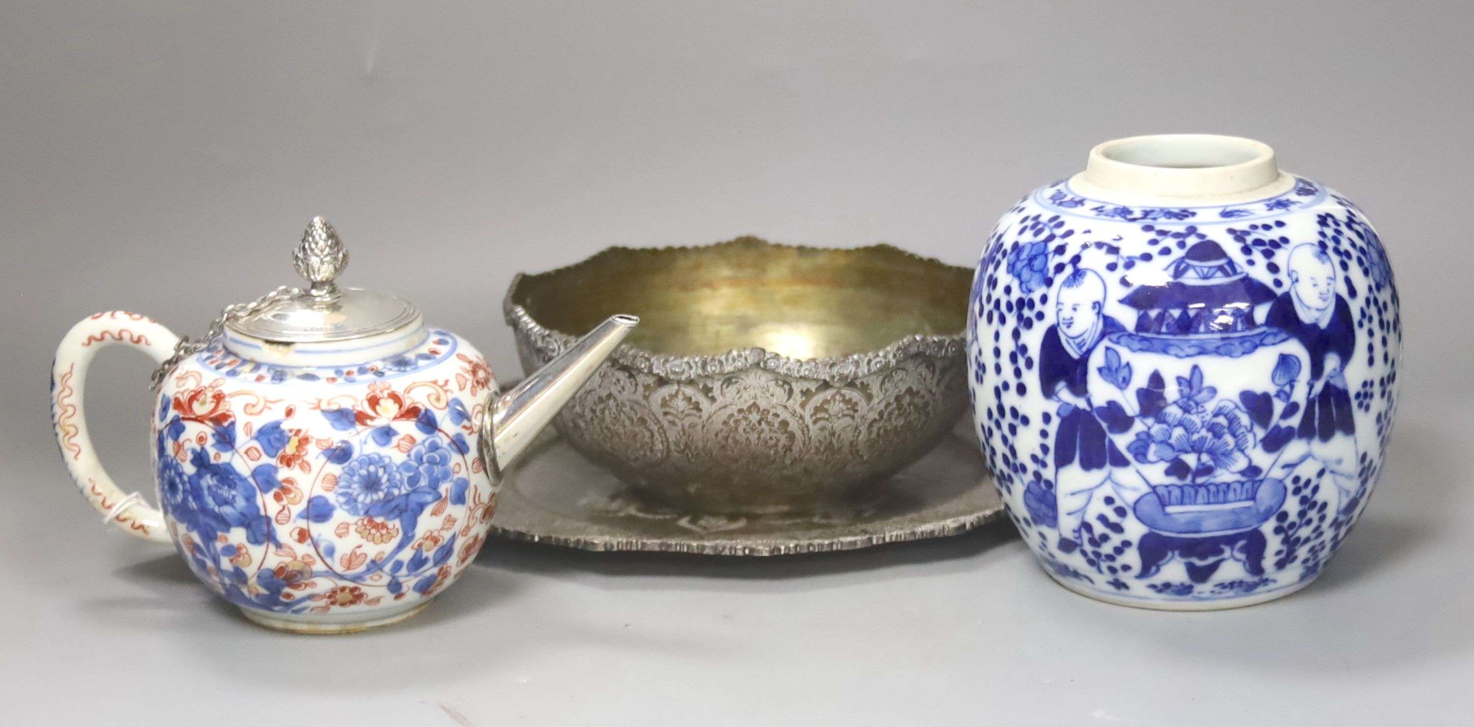 A Chinese Imari porcelain teapot with white metal cover, H 12cm, together with a 19th century Chinese blue and white jar, Kangxi marks to the underside, an eastern metal bowl and plate